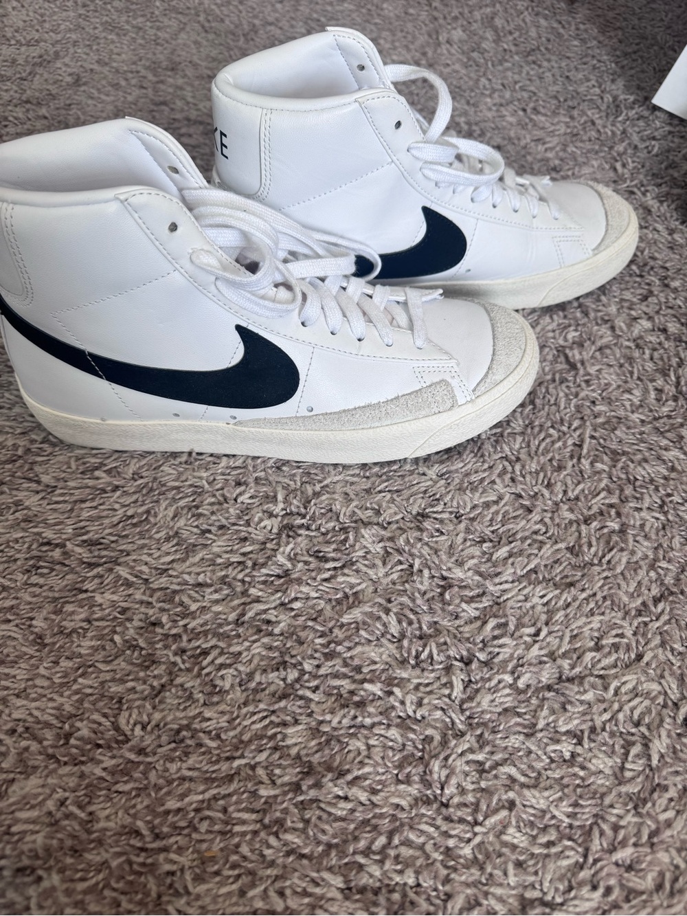 Nike Mid-Top Sneakers in White with Navy Swoosh